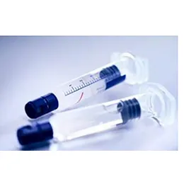 Syringe labelling machines