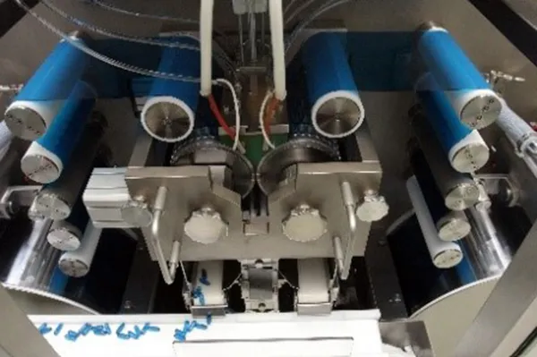 ENCAPSULATING MACHINE