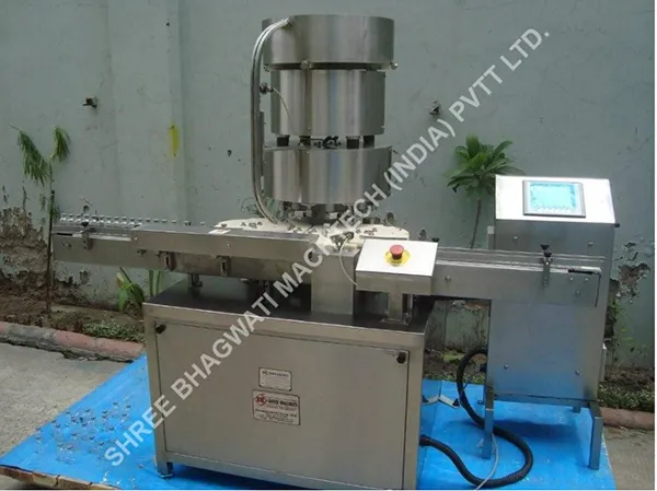 AUTOMATIC EIGHT HEAD ALUMINIUM VIAL CAP SEALING MACHINE MODEL NO. SBCS 200V GMP MODEL